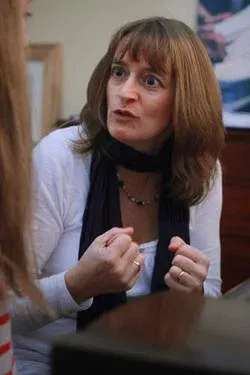 Alison explaining a point during a singing lesson